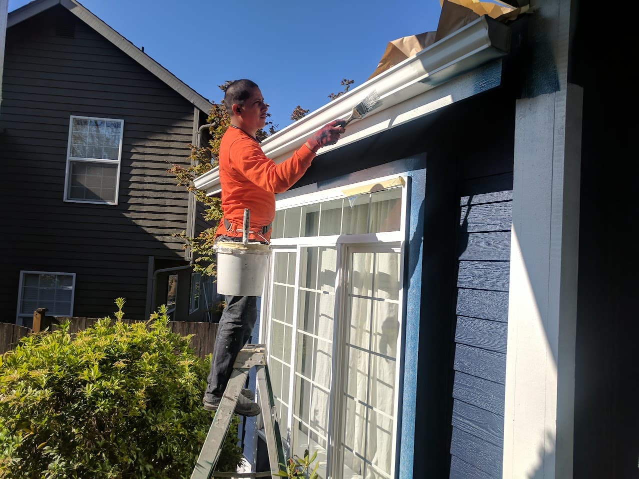 Alltech Painting crew completing detailed exterior trim painting in Seattle